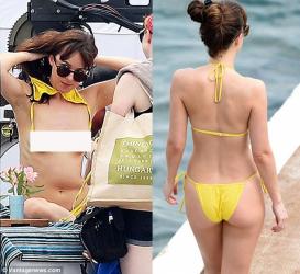 Mỹ nữ "50 sắc thái" hồn nhiên cởi bikini gây náo loạn biển